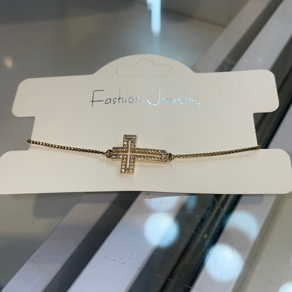 Brand New Womens cross bracelet